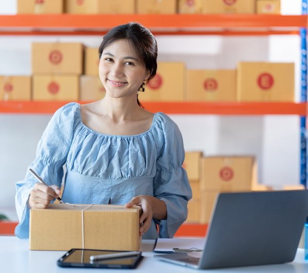 Starting small businesses SME owners female entrepreneurs check online orders to prepare to pack the boxes, sell to customers, sme business ideas online.